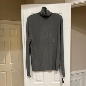 And now this men’s gray turtleneck sweater medium